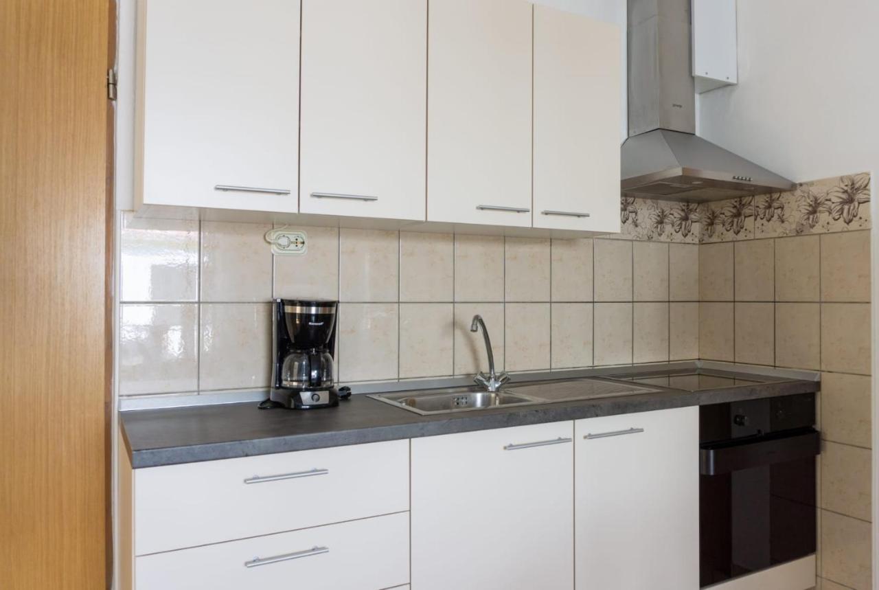 Apartmani Devcic Palit Exterior foto